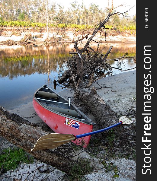 Original image of a canoe on the banks of Peace River in Florida. Original image of a canoe on the banks of Peace River in Florida.