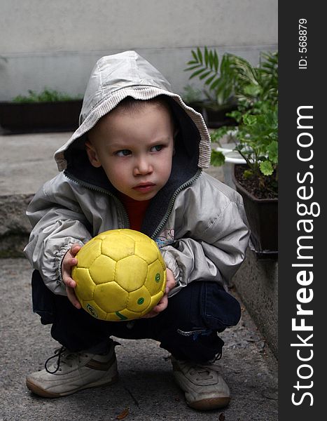 Boy With Yellow Ball