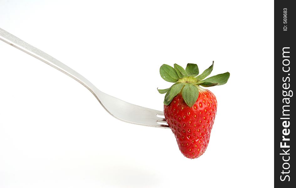 Strawberry and fork