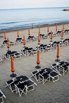 Closed Umbrellas On The Beach Stock Photos Closed Umbrellas On The Beach Stock Photos