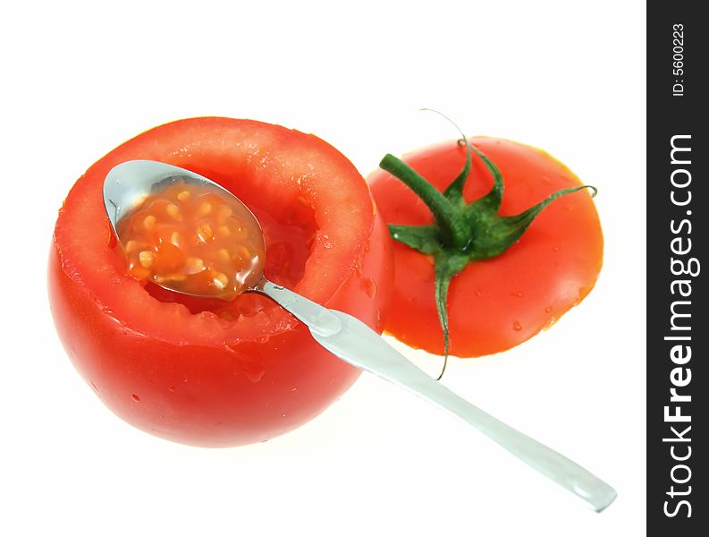 Fresh tomate for a breakfast on white. Fresh tomate for a breakfast on white