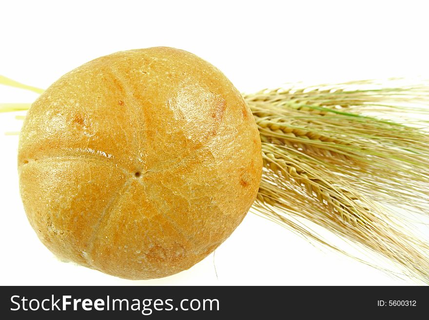 Wheat and bread isolated over white. See my other food images.