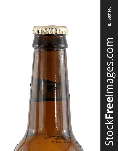 A Isolated brown beer bottle with cap