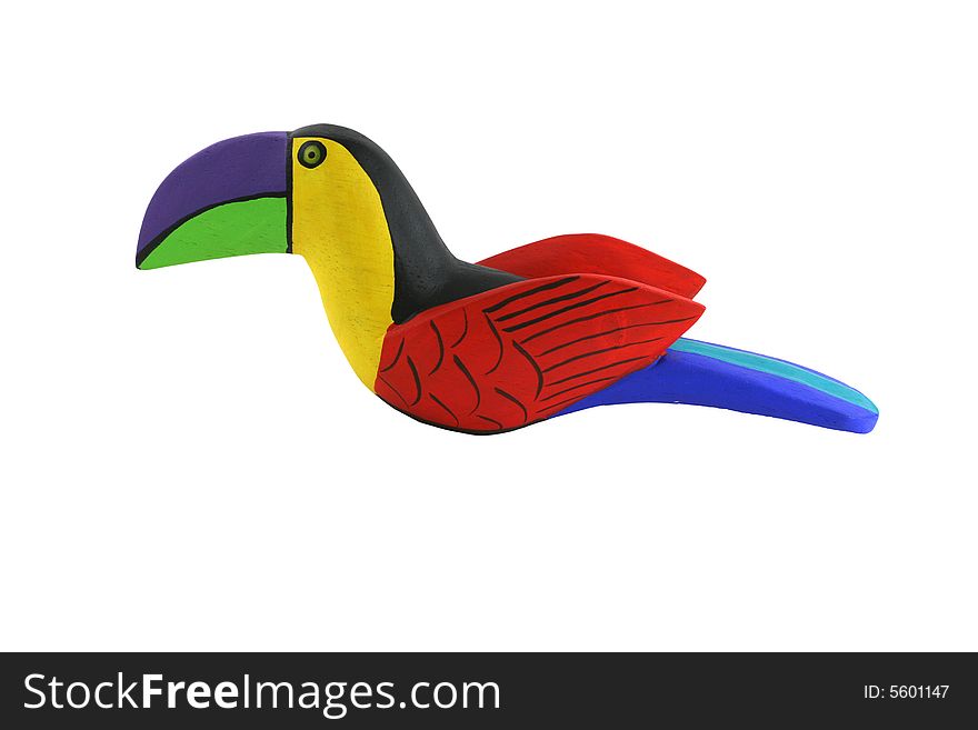 A Isolated Brightly colored handcarved wooden toucan