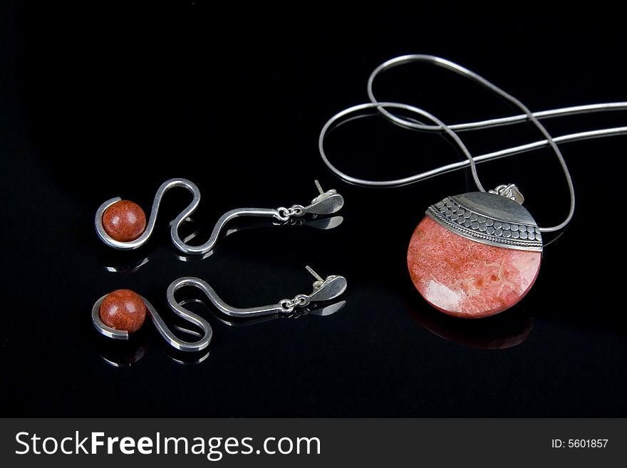 Red coral pingent , silver necklace and earrings. Red coral pingent , silver necklace and earrings