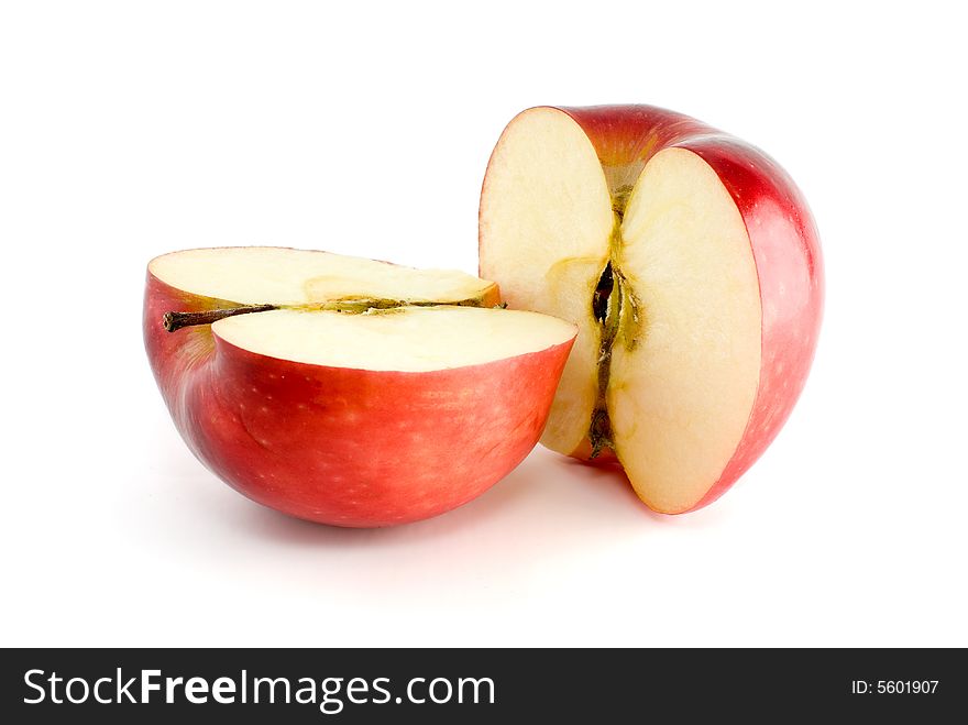 Two red apple halves isolated on the white background