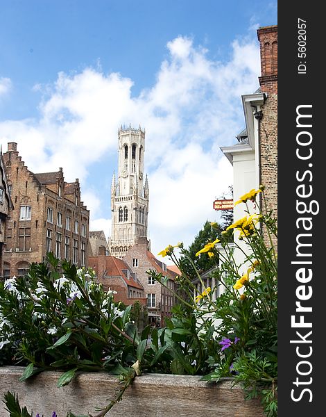 The Market square is dominated by the cloth hall and the 83 meter high Belfry tower, one of the symbols of the city Bruge. The Market square is dominated by the cloth hall and the 83 meter high Belfry tower, one of the symbols of the city Bruge.