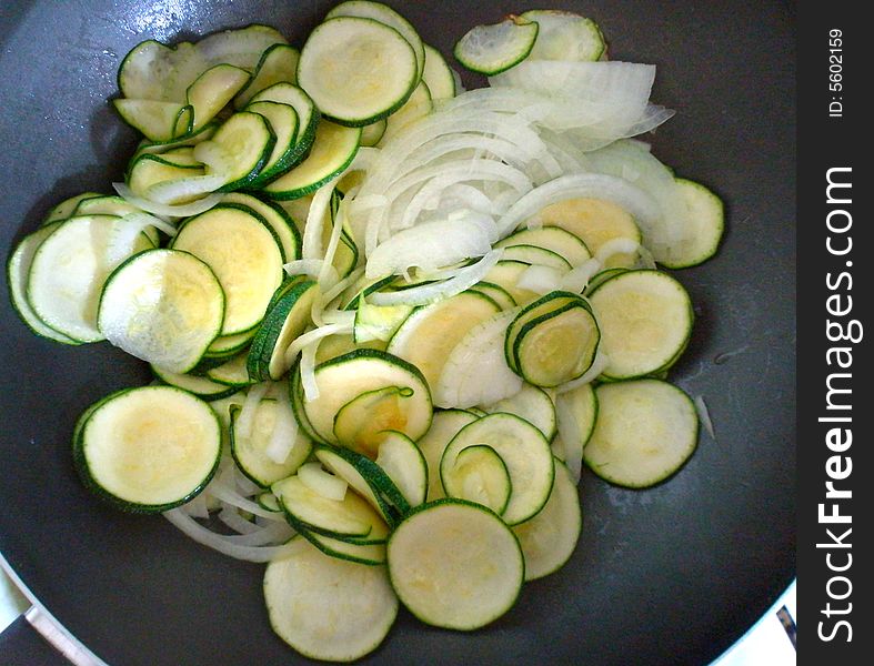 Zucchini And Onion Cooking