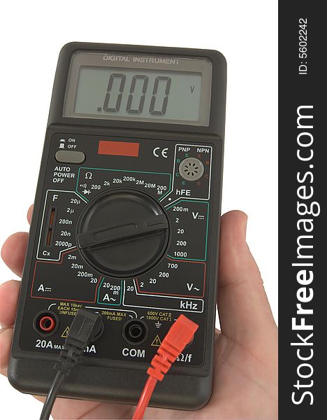 Digital multimeter in hand isolated over white