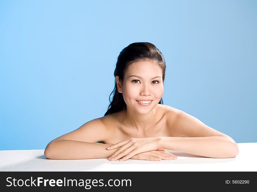Refreshing smile of young woman with long black hair. Refreshing smile of young woman with long black hair
