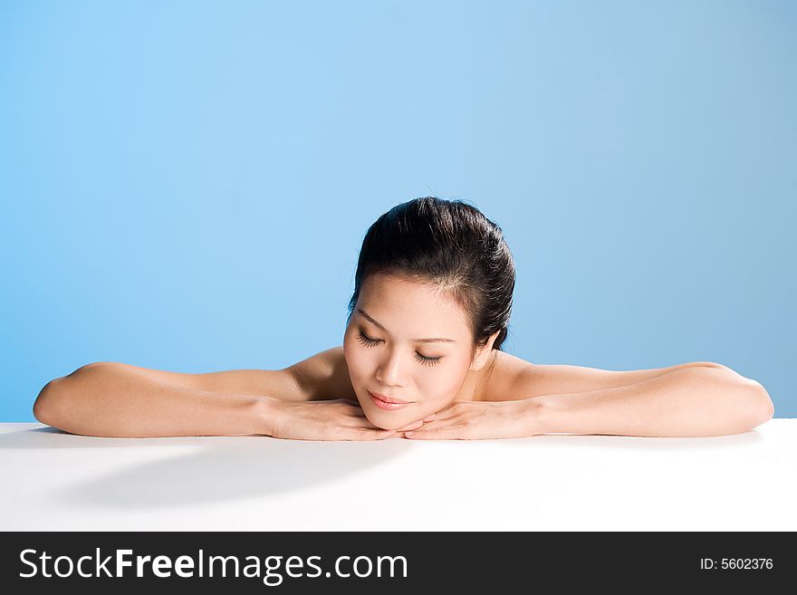 Refreshing and clean face of young woman feels relaxing. Refreshing and clean face of young woman feels relaxing