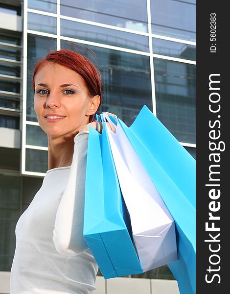 Young woman with shopping bags. Young woman with shopping bags