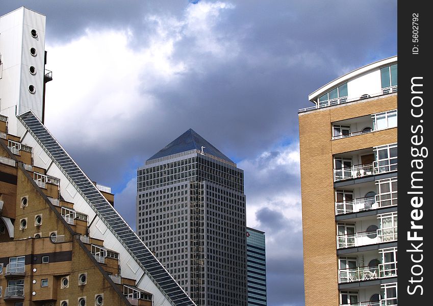 View of Canary Wharf through office and residential flats on the Thames in London. View of Canary Wharf through office and residential flats on the Thames in London