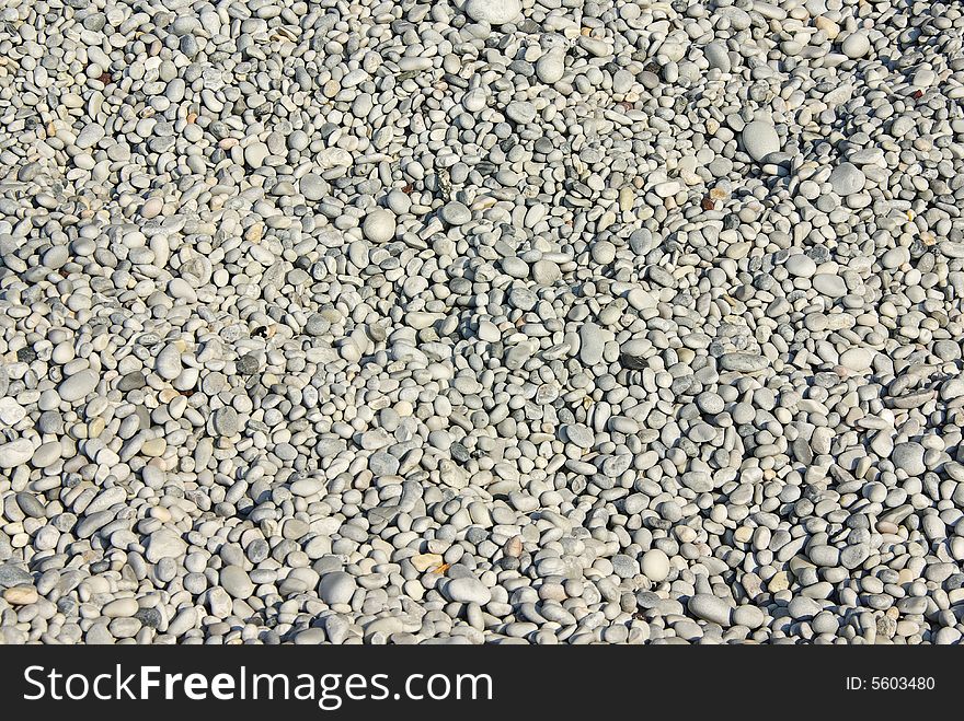 Close up photo of beach pebbles.