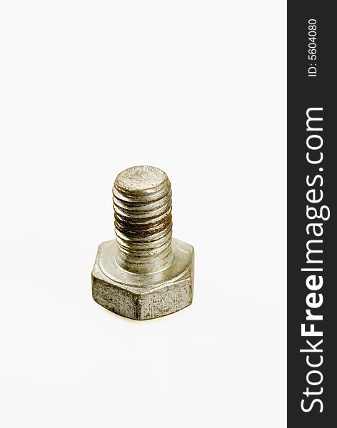 Rusted bolt against white background