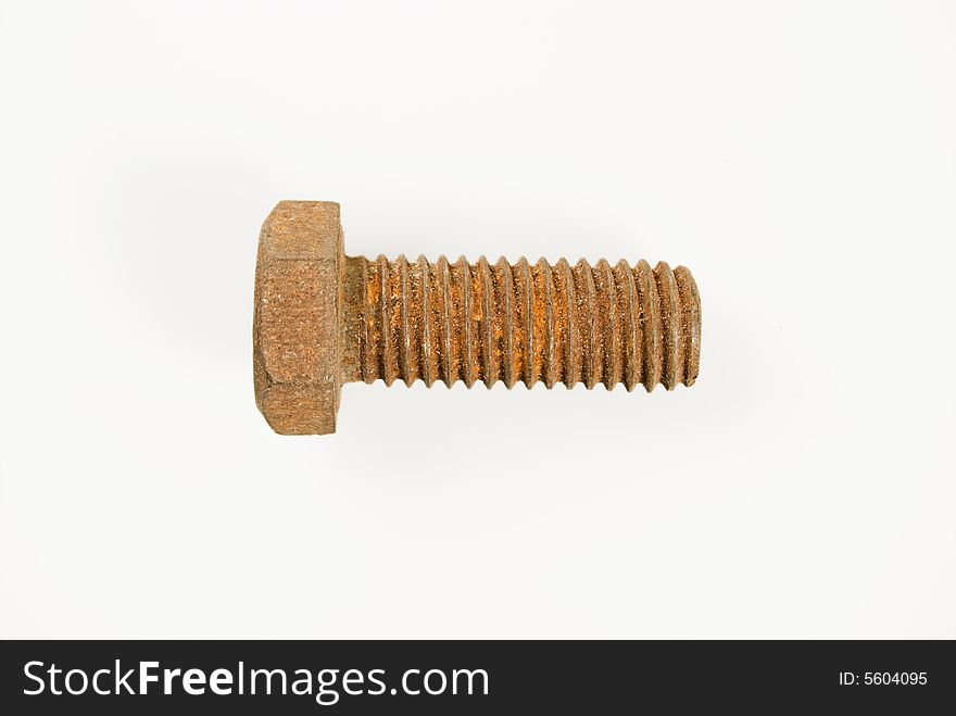 Rusted bolt against white background