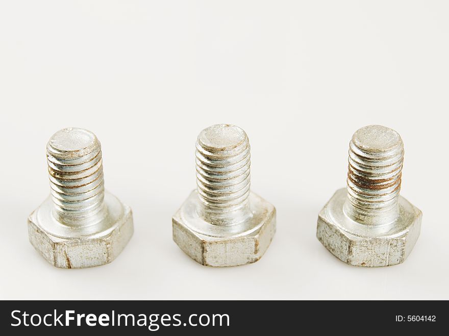 Rusted bolt against white background