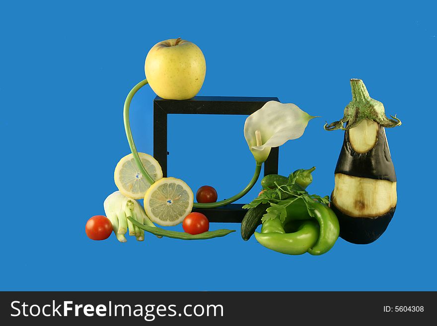 Still-life from fruit, flowers and a black frame. Still-life from fruit, flowers and a black frame