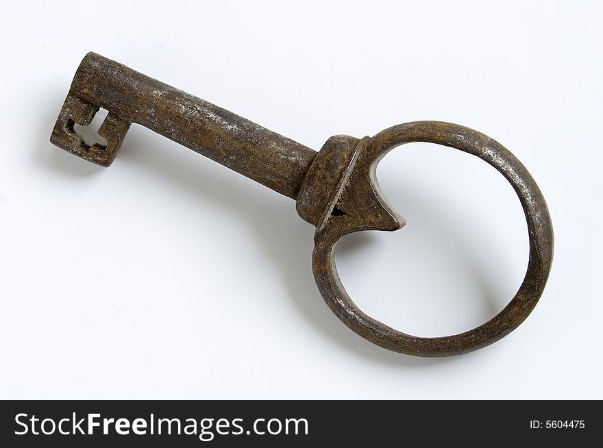Vintage rusted key isolated on white. Vintage rusted key isolated on white