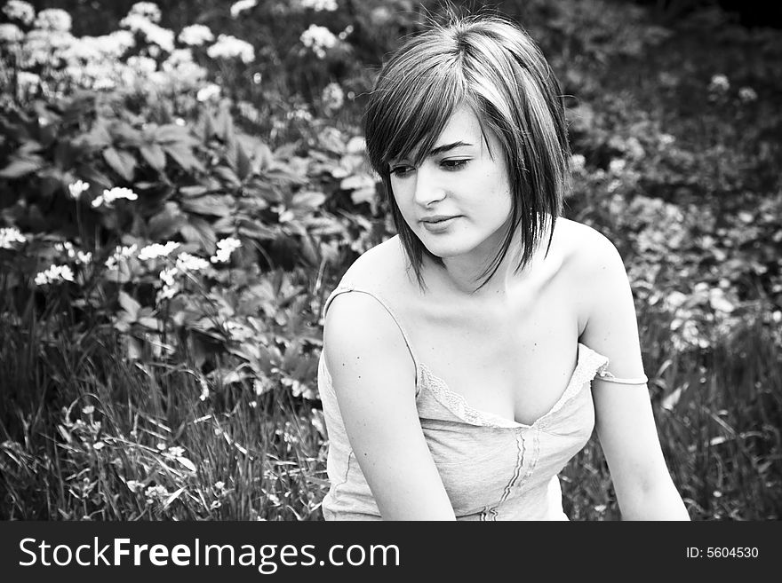 Portrait of sensual woman in nature, black and white.
