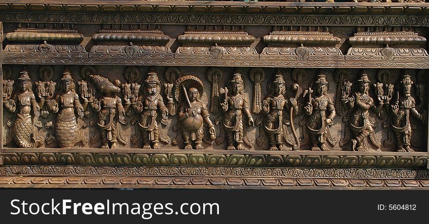 An artistic panel made out of wood with Indian Gods Godesses  seen at Handicraft fair at Ahmedabad. An artistic panel made out of wood with Indian Gods Godesses  seen at Handicraft fair at Ahmedabad.