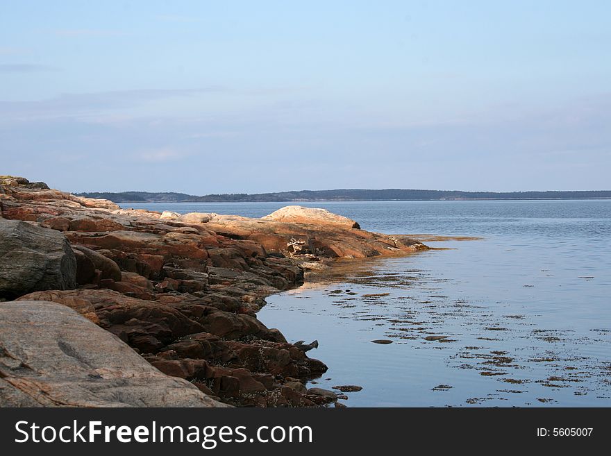 North: sea, sky and rock. North: sea, sky and rock