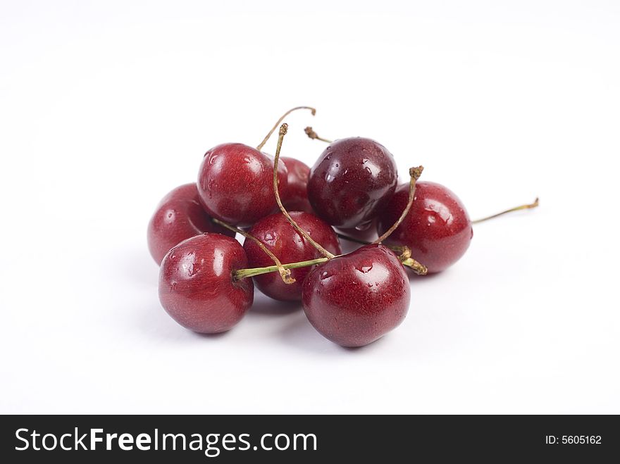 Sweet fresh red cherries isolated on white background. Sweet fresh red cherries isolated on white background