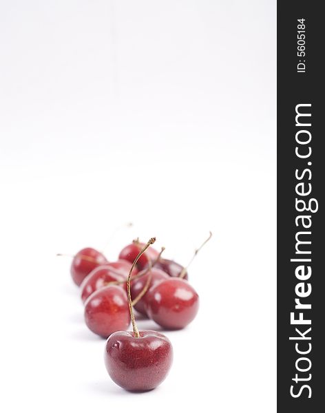 Sweet fresh red cherries isolated on white background. Sweet fresh red cherries isolated on white background