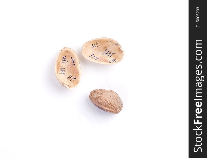 Solted pistachio nut at white isolated background