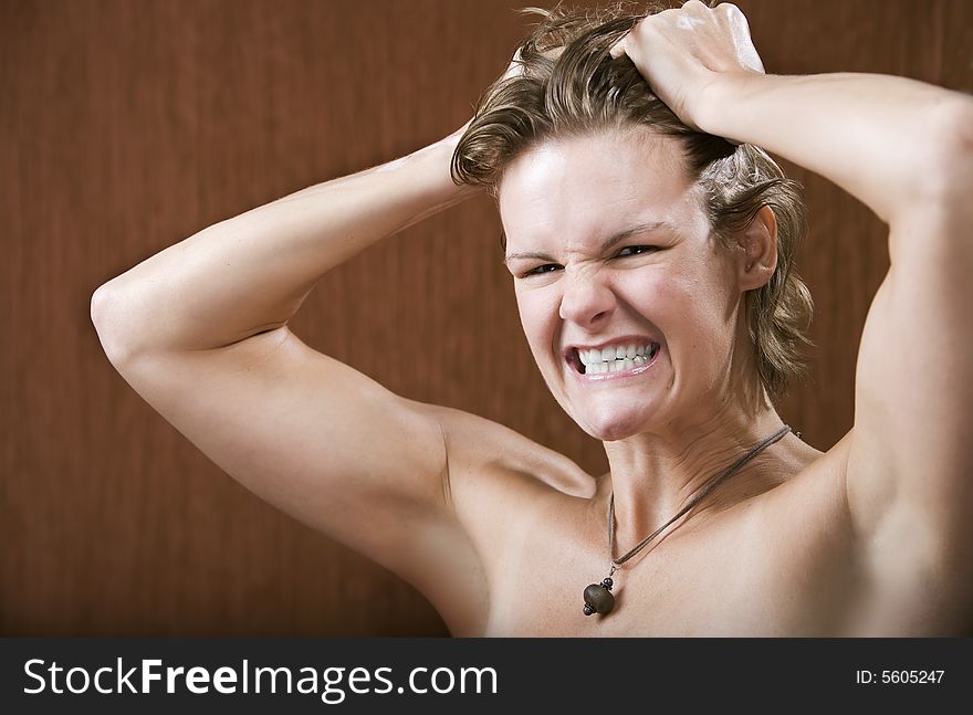 Portrait of a frustrated woman pulling her hair