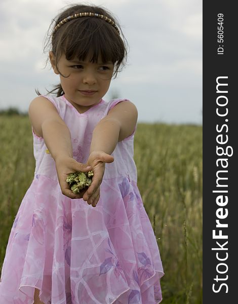 Young baby Farmer holding crops. Young baby Farmer holding crops