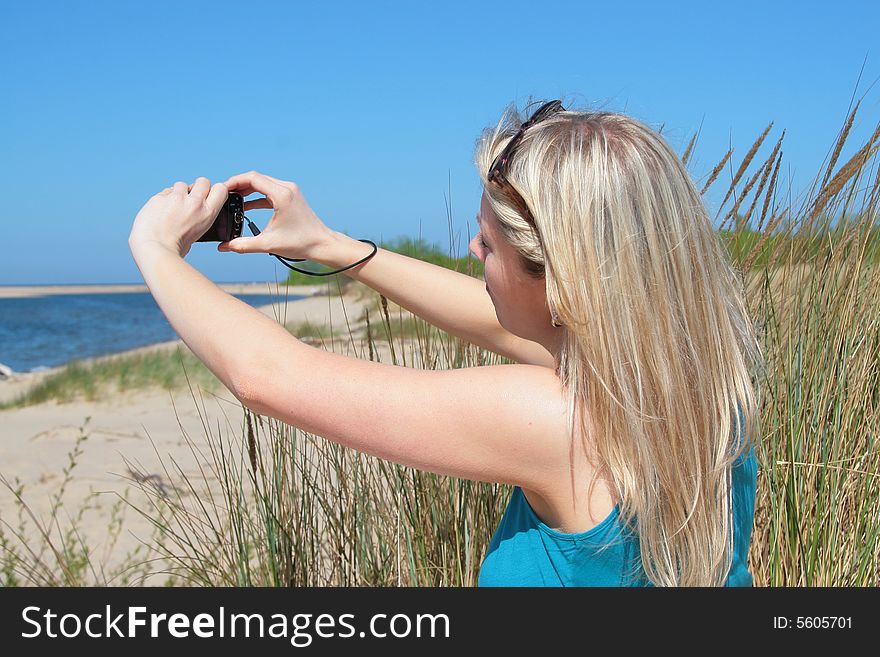 Photo of attractive blonde in the sun. Photo of attractive blonde in the sun