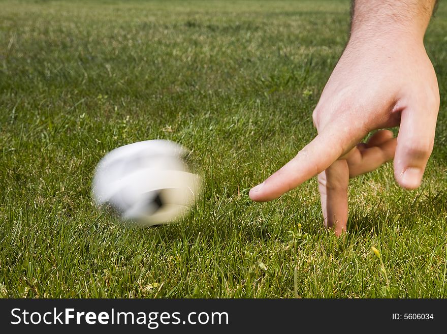 Soccer field - a ball in motion