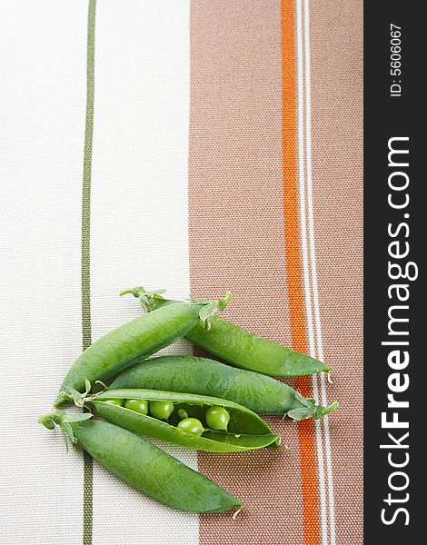 Fresh Green Peas On Tablecloth Background