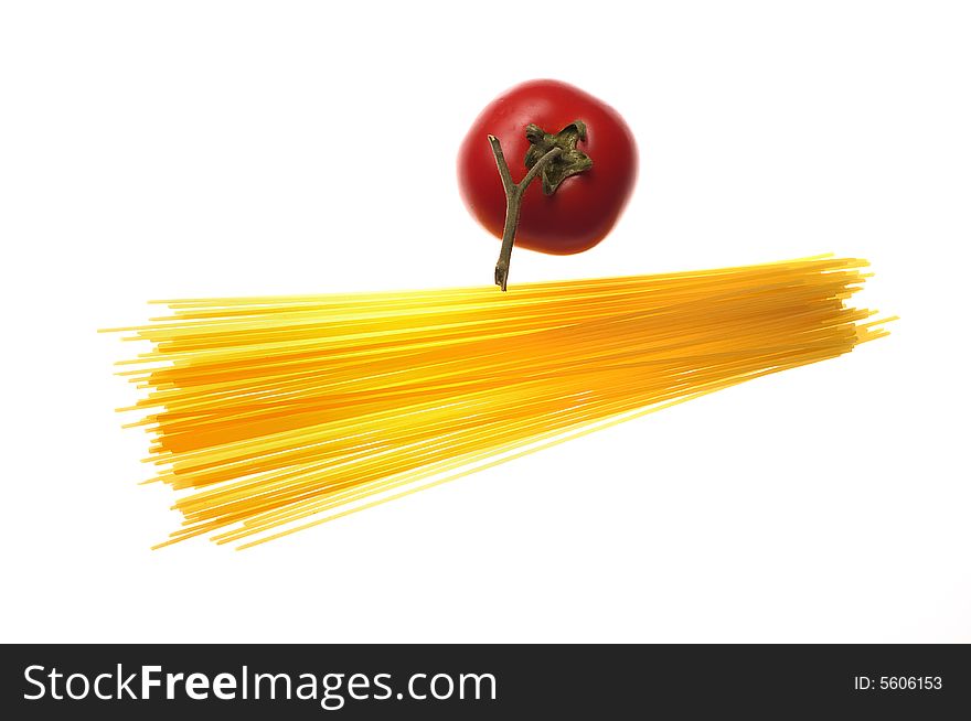 A shoot of pasta and tomato on withe background
