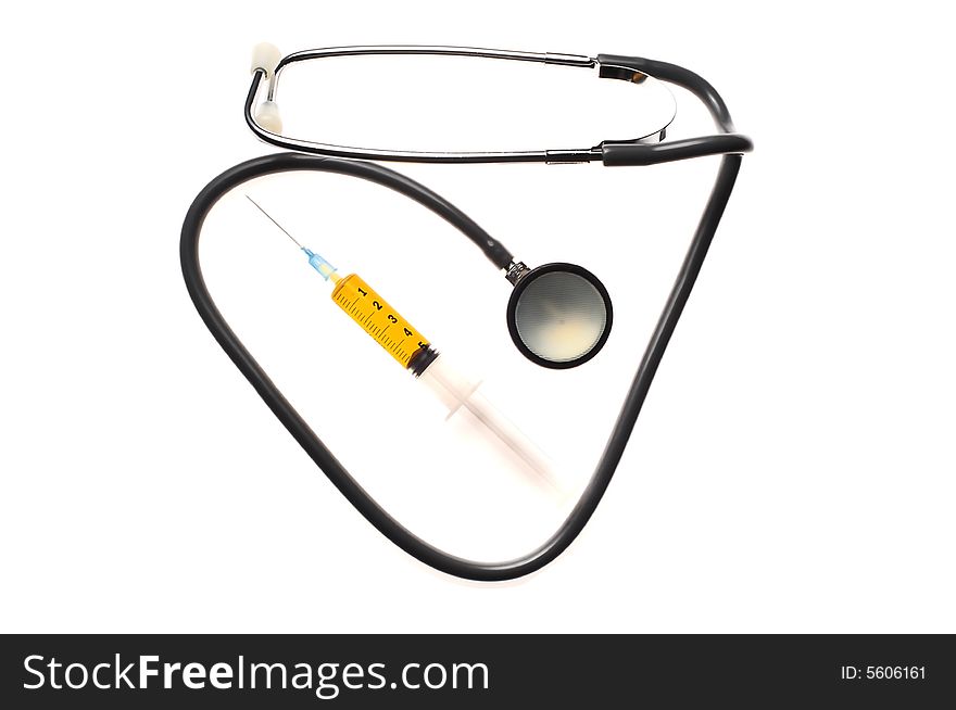 A composition of stethoscope and syringe. A composition of stethoscope and syringe