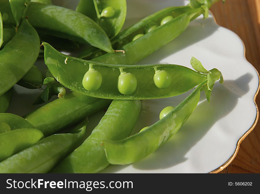 Green peas on a dish