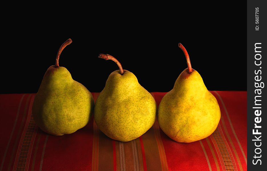 Pears set up with varoius backgrounds on various fabrics