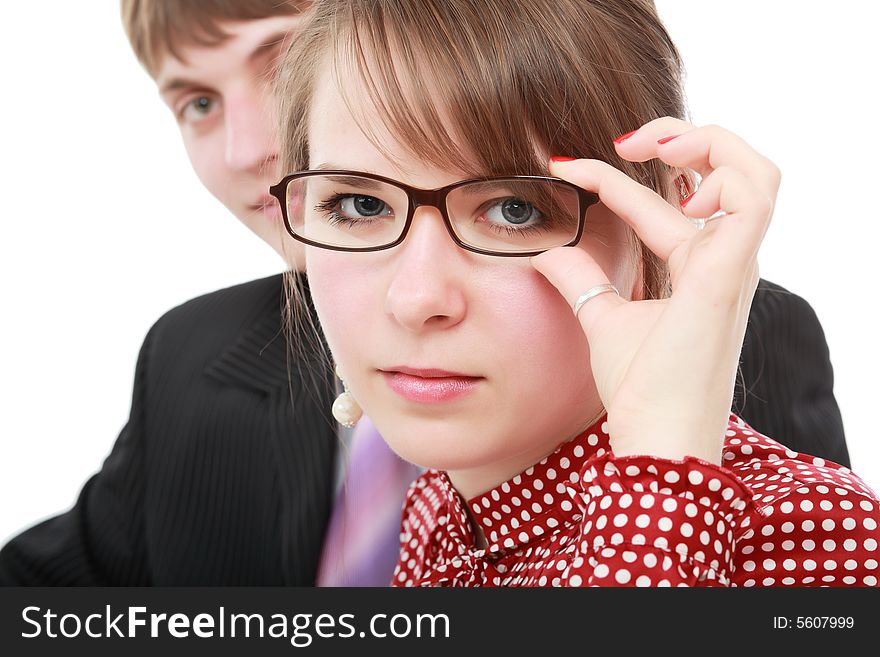 Group of business people working together. Shot in studio. Group of business people working together. Shot in studio.