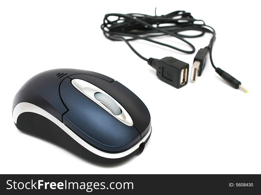 A mouse and USB port cables on white background. A mouse and USB port cables on white background.