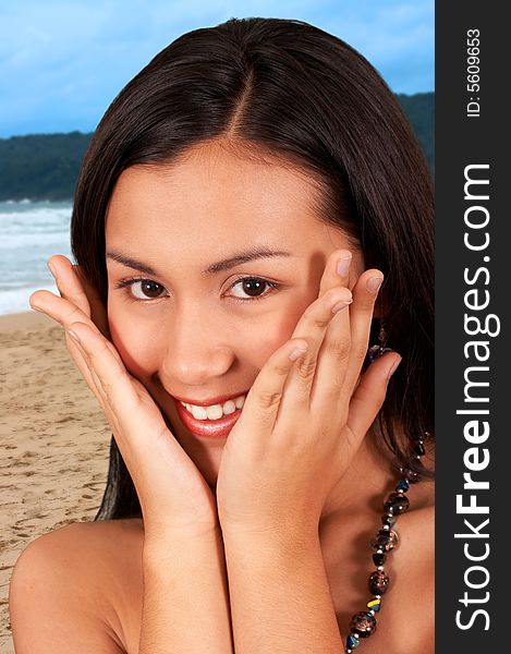 Lovely woman having fun on the beach