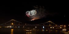 Fireworks In Black Sky Over Bridge Royalty Free Stock Image