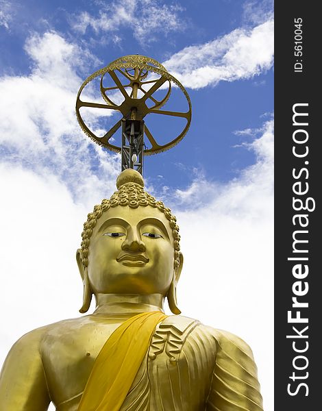 Buddha with blue sky in background. Buddha with blue sky in background