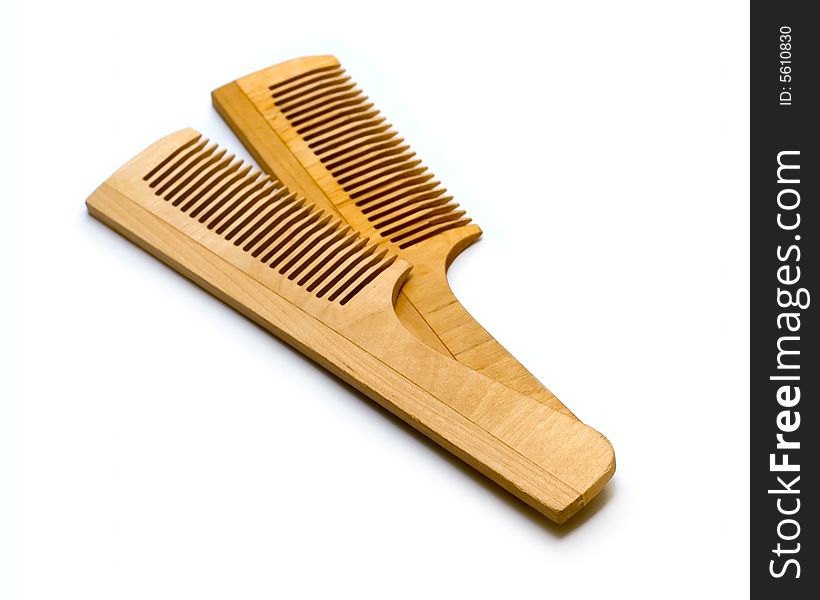 Wooden Hairbrush isolated on white for your design