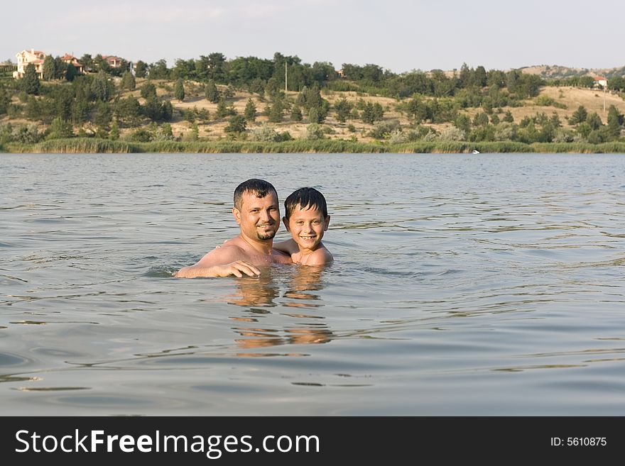 Man And His Son  In The Water