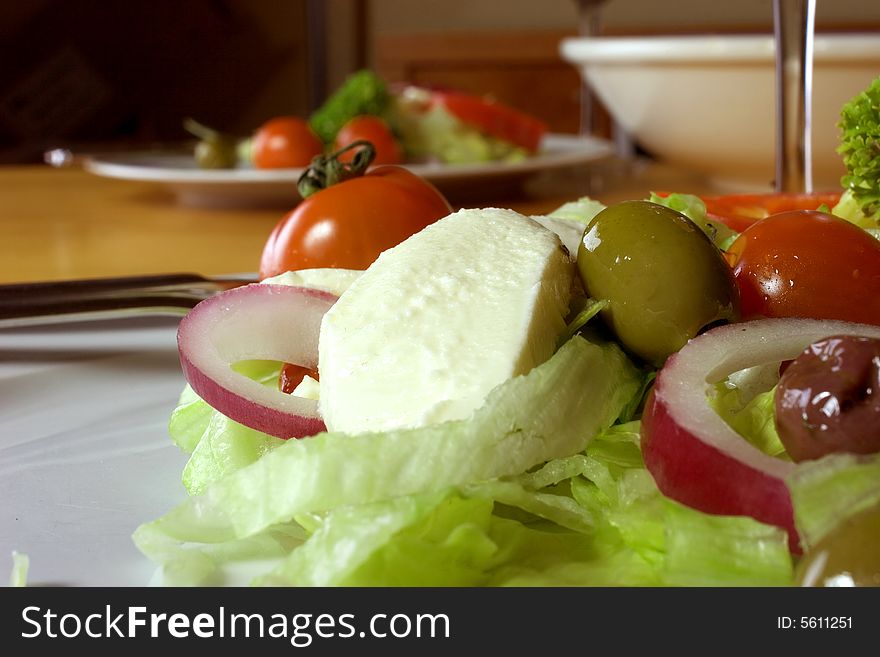 Table setting with Italian salad. Table setting with Italian salad