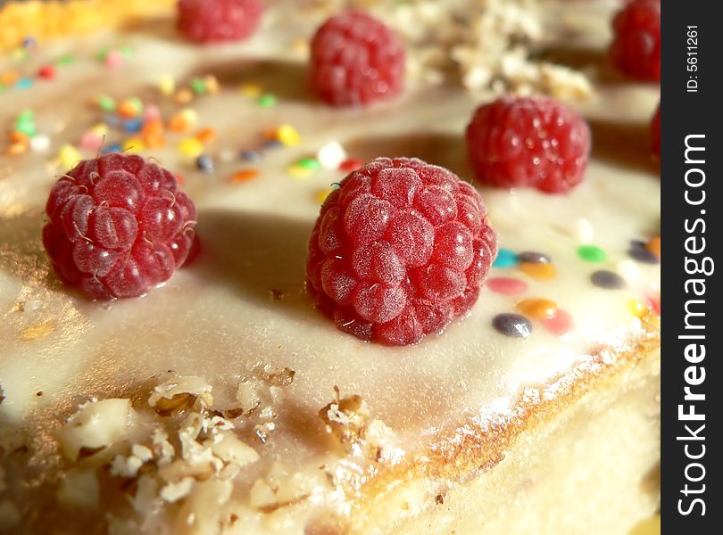 Red berry of raspberry on a pie