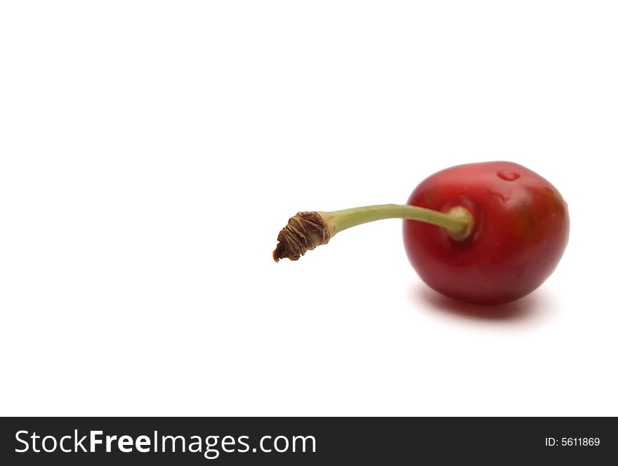 One cherry isolated one white