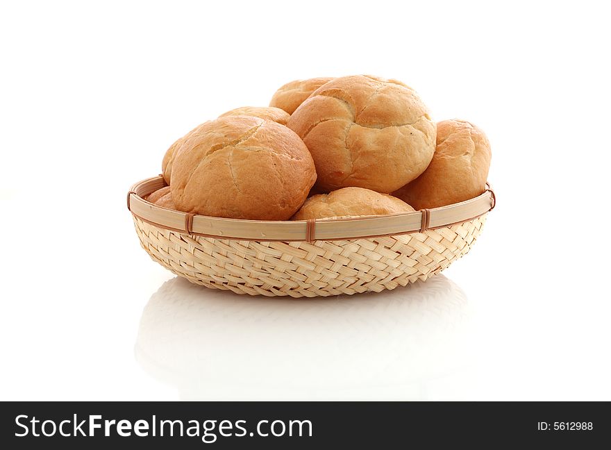 Fresh baked rolls on white background