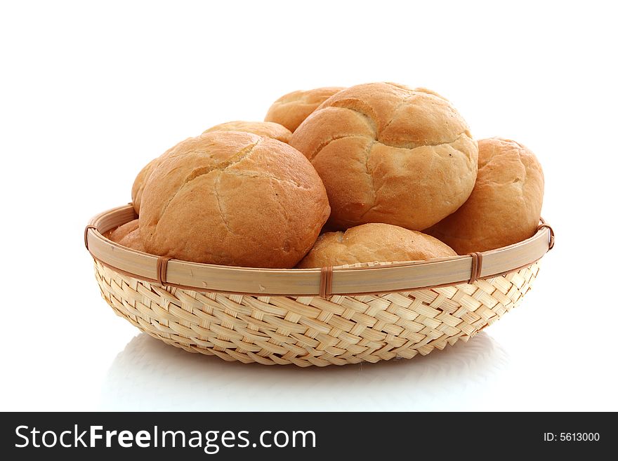 Fresh baked rolls on white background